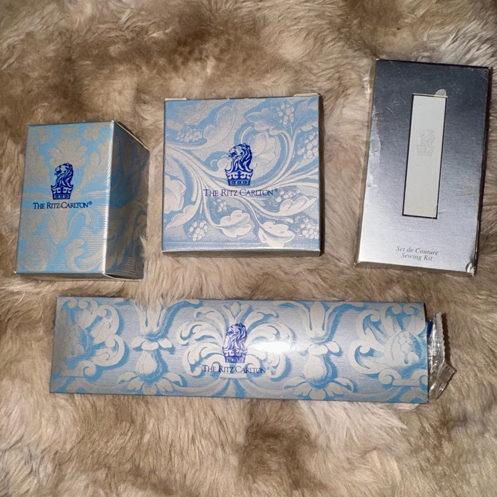 The Ritz Carlton amenities ~ Shower Cap, Shoe Polish,  Comb and Sewing Kit